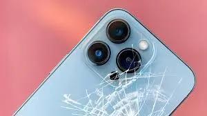 Technician examining an iPhone for screen replacement, showcasing professional repair practices